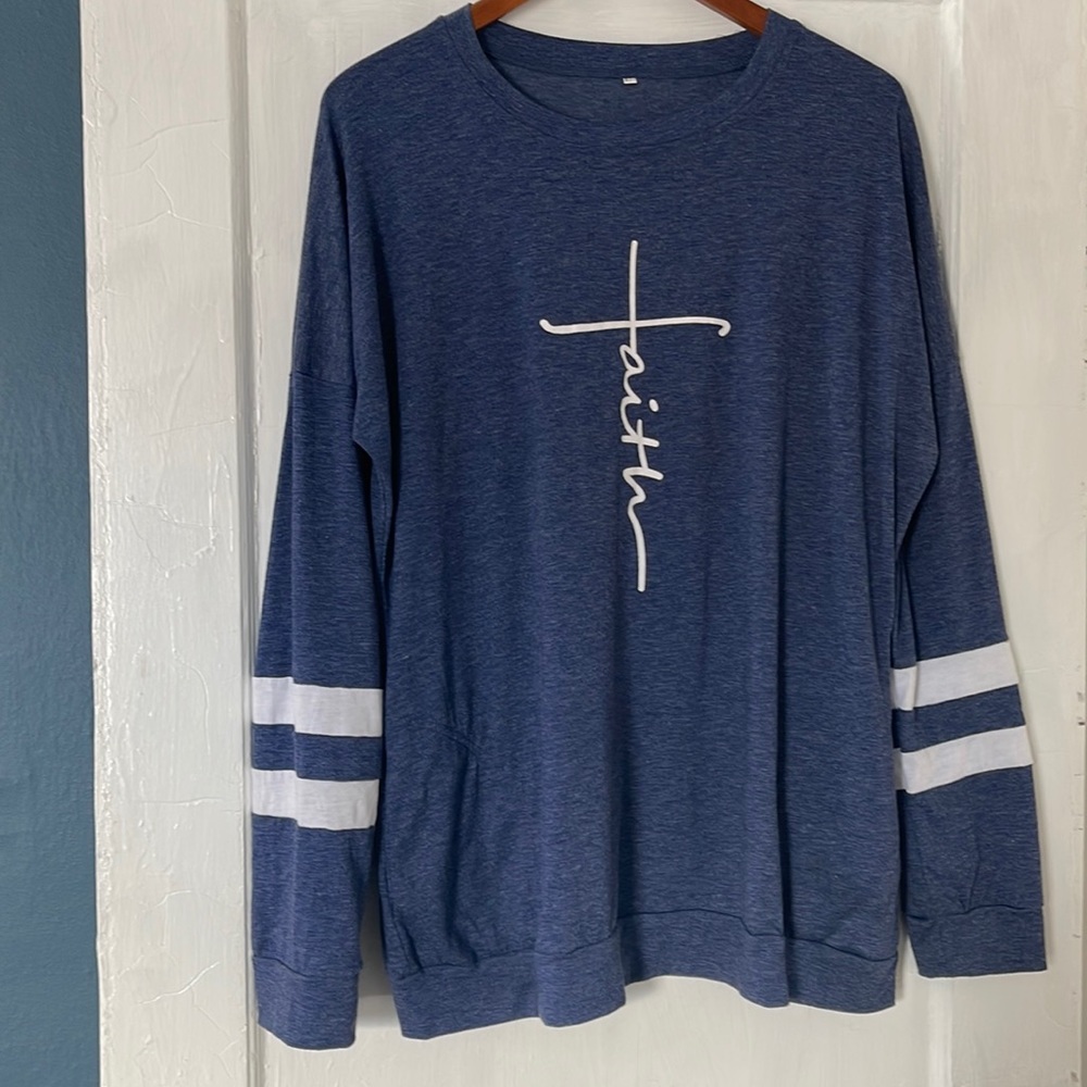Long Sleeved Faith shirt. Size Large.